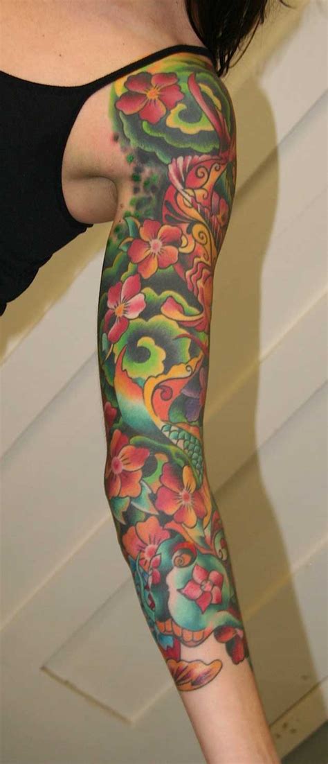 Koi and lotus flower sleeve tattoo. 30 Fabulous Floral Sleeve Tattoos for Women - TattooBlend
