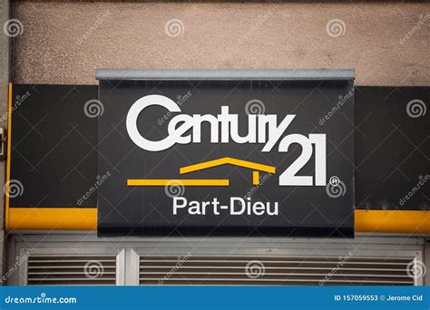 Century 21 Logo In Front Of Their Real Estate Agent For Lyon Century