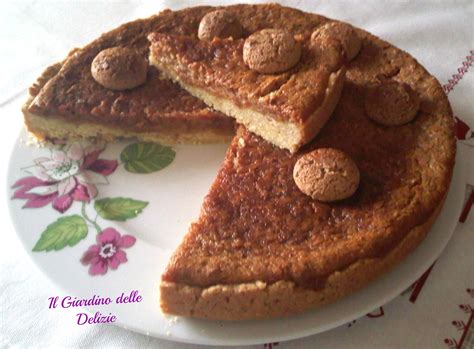 È decorato inoltre da ciliegie rosse candite e ghiaccia reale. Dolce amaretti philadelphia | IL GIARDINO delle DELIZIE