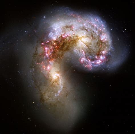 Colliding Galaxies Make Love Not War Esahubble