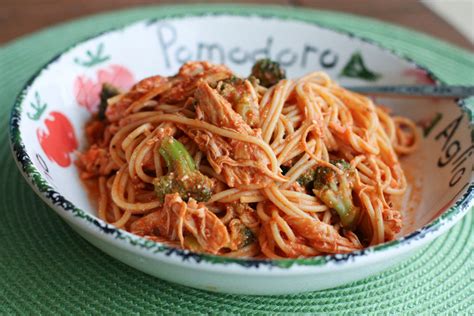 When the chicken has cooked through and is no longer pink in the center, chop up 4 cups of broccoli. Creamy Crock Pot Chicken Spaghetti with Broccoli