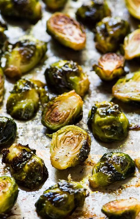 Using tongs, arrange brussels cut side down on baking sheet. How to cook crispy oven roasted Brussels sprouts. Easy method that w… (With images) | Brussel ...