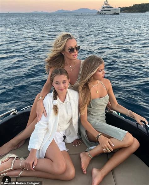 Amanda Holden Poses With Her Lookalike Daughters Lexi 17 And Hollie 11 As They Enjoy A Boat