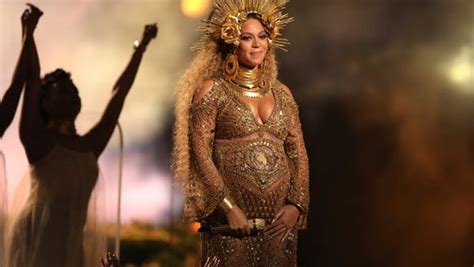 Beyonce Shows Off Her Henna Tattooed Belly At A Baby Shower For The Twins