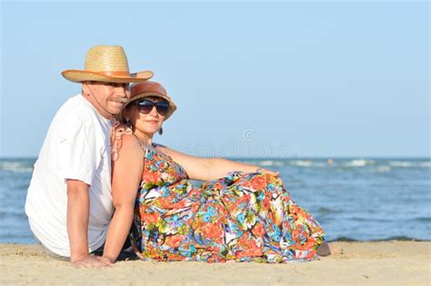sea walk and happy mature couple at seashore sandy beach and holding hands stock image image of