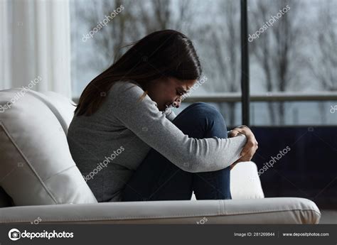 Sad Girl Crying And Complaining Alone At Home Stock Photo By