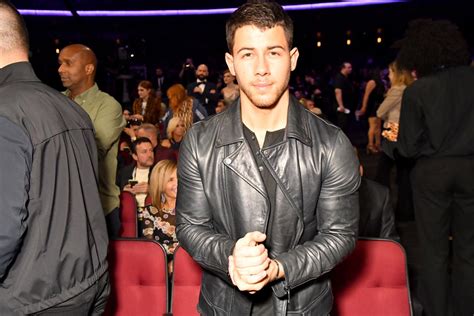 Nick Jonas Shows Off His Muscles At The
