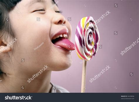 Girl Having Fun Licking Lollipop Stock Photo 94438096 Shutterstock
