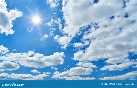 Blue Sky With Sun And White Clouds Stock Photo Image Of Idyll Light