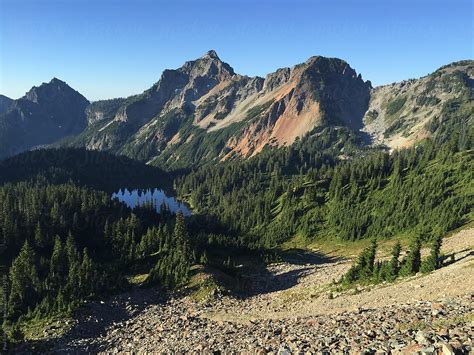 View Of Pristine Alpine Lake And Expansive Mountains North Cascades