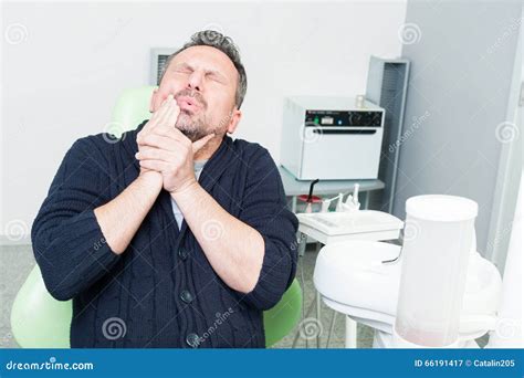 Dentist Patient Expressing Tooth Pain Or Toothache Stock Image Image