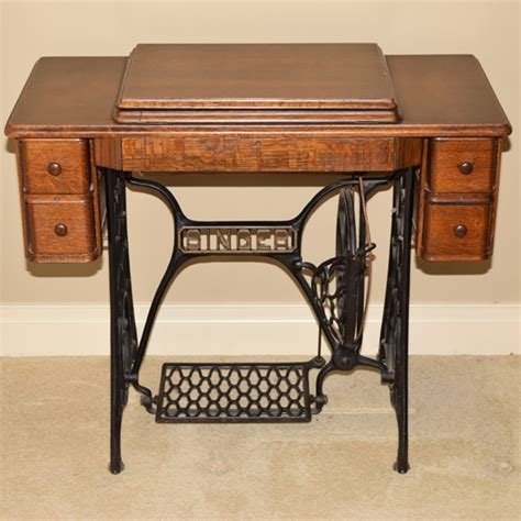 Antique Singer Sewing Machine And Tiger Oak Table Ebth
