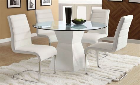 Round tables are easy to move around while square tables pair well with sectionals. Mauna White Glass Top Round Dining Room Set from Furniture ...