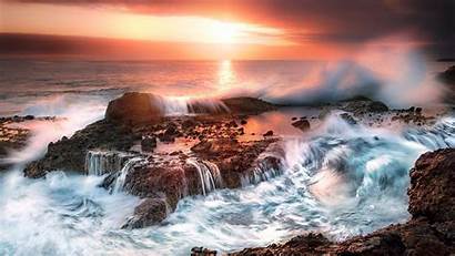 Crashing Waves Rocks Against Ocean Sunset Rock