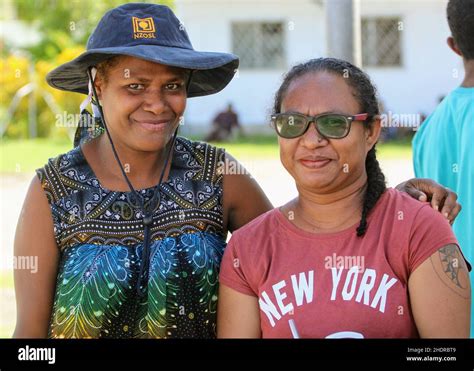 Two Melanesian Women Smiling As Their Picture Is Being Taken In March