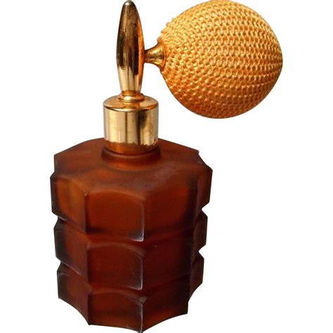 A Vintage Perfume Of Amber Colored Frosted Glass With Intact Atomizer The Perfume Measures 4 5