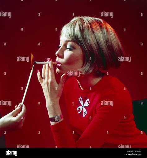 Woman Smoking Cigarette Historical Hi Res Stock Photography And Images