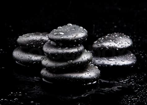 Black Shiny Zen Stones With Water Drops Stock Image Colourbox