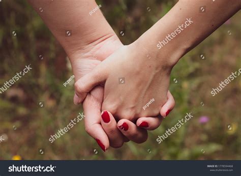 Two Girls Hold Hands Sign Friendship Stock Photo 1778594468 Shutterstock