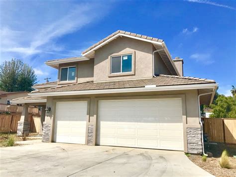 Santee, CA - Check out this 4 bedroom, 2.5 bath property located at 9436 Slope Street in Santee ...