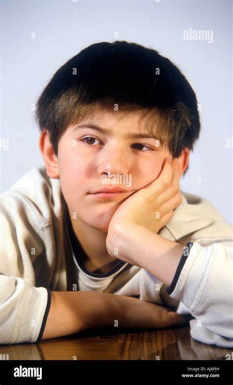 Portrait Of An Unhappy Young Boy Stock Photo Alamy