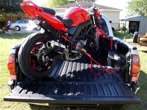 Load any bike up to 1,000 lbs into the bed of your truck with the push of a button. Hauling a motorcycle in a short bed | Tacoma World