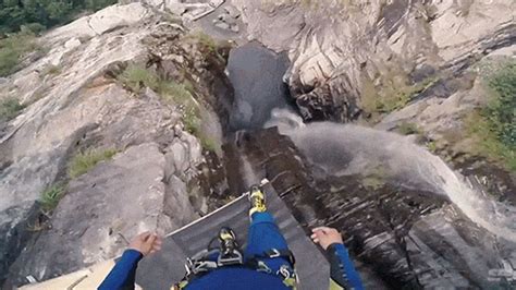 Watch A Guy Jump Nearly 200 Feet Off A Cliff And Plunge Straight Into
