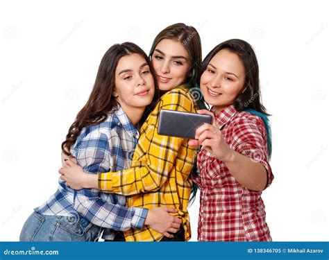 selfie femme heureuse d adolescents prenant des photos seuls d isolement sur le fond blanc