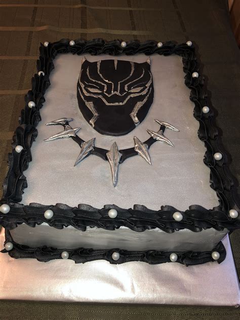 The birthday boy and his guests are sure to be impressed with this super hero cake! Black Panther cake | Superhero birthday cake, Panthers ...
