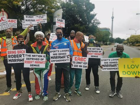 WATCH Just A Few Fans Brave Rain To March For Robert Marawa At The SABC