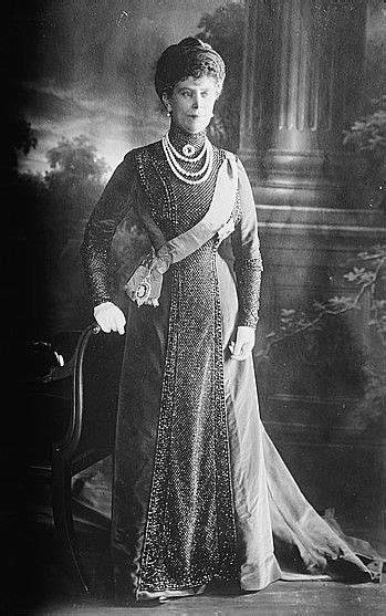 Queen Mary Wearing The Prince Albert Sapphire Brooch And The Caroline