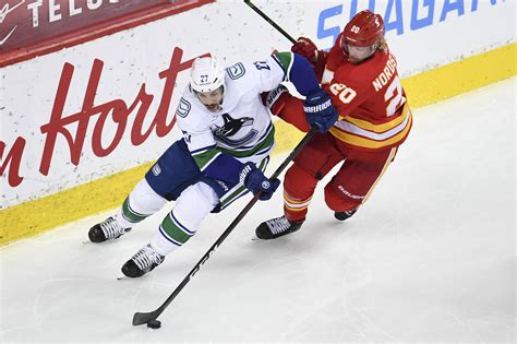 travis hamonic s future with vancouver canucks may be in jeopardy nhl trade rumors