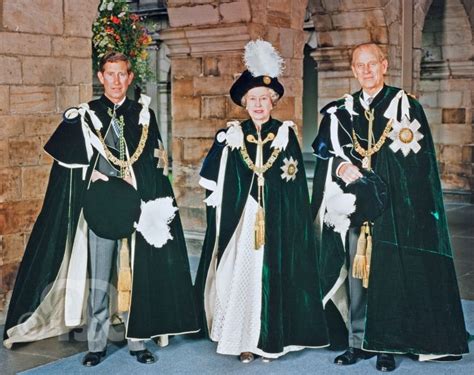 Queen Elizabeth Ii Prince Philip And Prince Charles In Their Robes Of