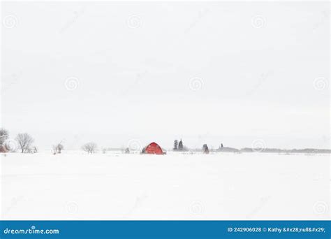A Old Red Barn In A White Winter Landscape Stock Photo Image Of