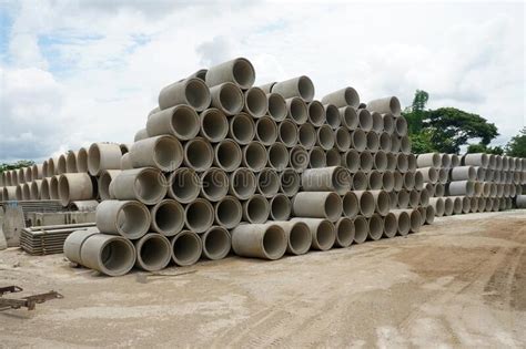 Stacked Cement Drainage Pipes At Concrete Factory Reinforced Concrete
