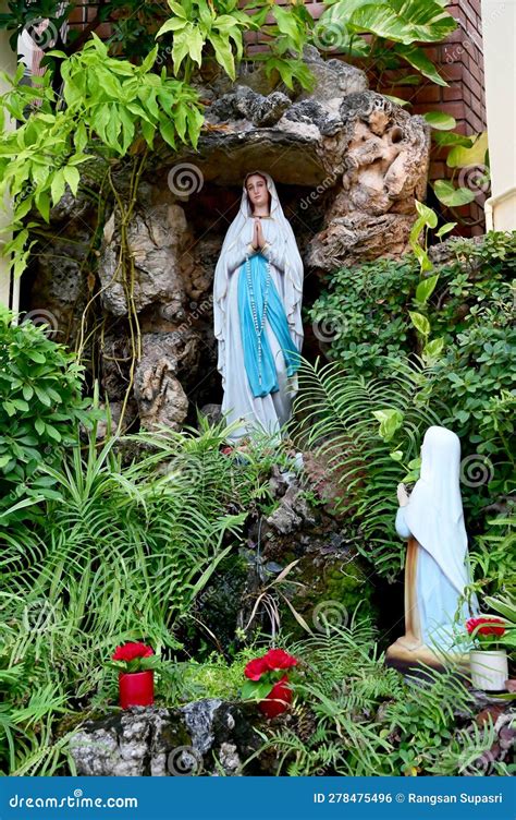 Statue Of Our Lady Of Grace Virgin Mary View With Natural Background In