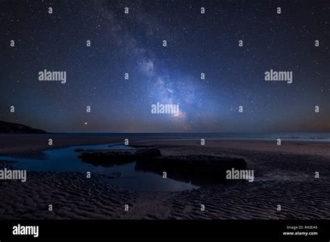 Stunning Vibrant Milky Way Composite Image Over Landscape Of Dunraven
