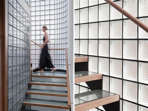 The Walls Of Glass Blocks Surrounding These Stairs Help To Provide