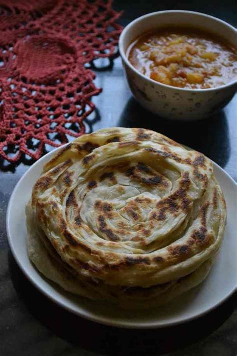 A plain roti that we make at home, has approximately 297 calories. Roti Canai | Recipe | Food recipes, Roti canai recipe ...