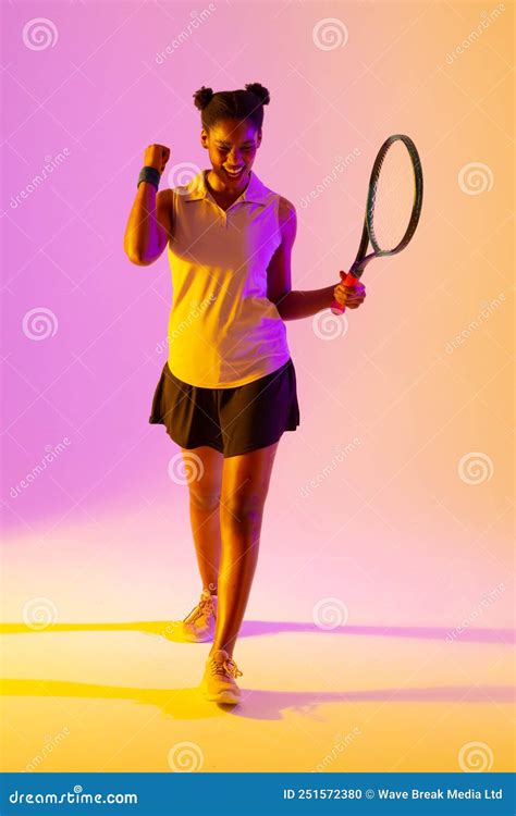 Vertical Image Of Successful African American Female Tennis Player In