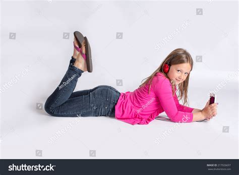 Young Girl Lying On Her Belly Foto Stok 217926697 Shutterstock