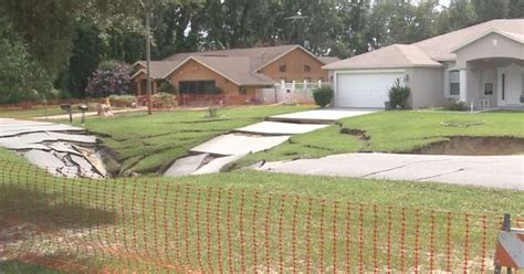 Massive sinkhole threatens Florida neighborhood