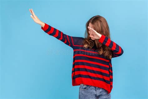 woman showing dab dance pose famous internet meme performing dabbing trends stock image