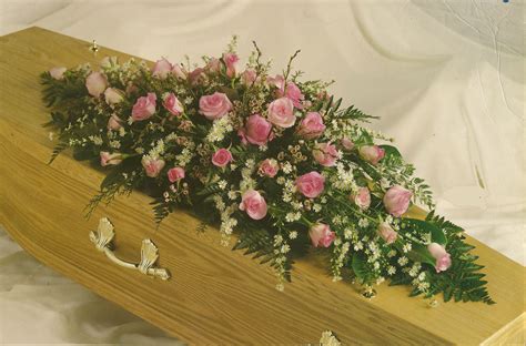 It is designed with lilies, snapdragon, avalanche roses and calla lilies. Funerals « Buds and Blooms Warsop