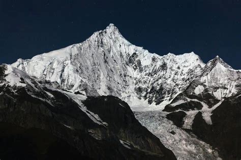 Kawagebo In Light Of The Full Moon Meili Snow Mountains Yunnan China