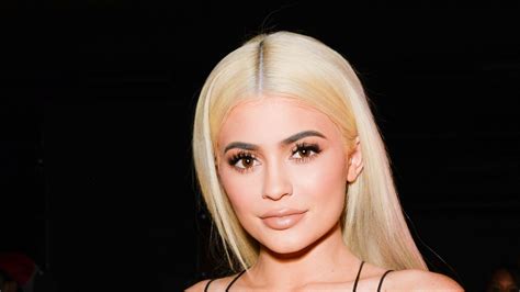 Kylie Jenner Wears White Holiday Dress With Feathers Teen Vogue