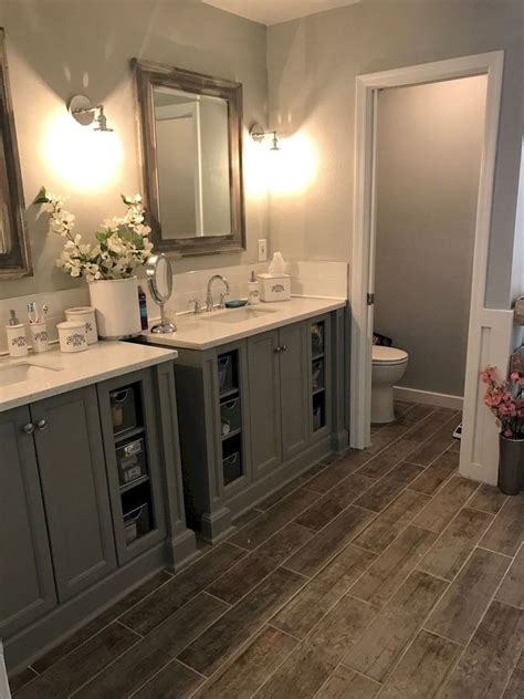 Modern farmhouse flooring done in a black and white patterned tile makes a statement in this farmhouse bathroom. Modern farmhouse bathroom design ideas (4) | Bathroom ...