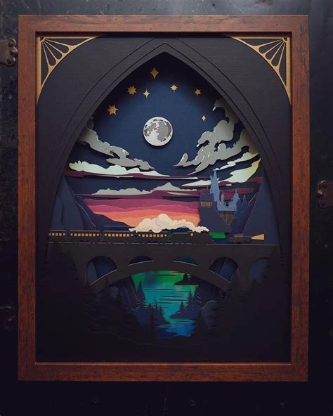 I had so much fun making this layered paper wizardry shadowbox! Thanks