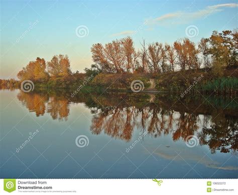 Autumn Reflection Of The Village On The River Bank Stock Photo Image