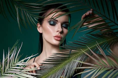 Premium Photo Tropical Portrait Sexy Woman In Leaves Palm Tree